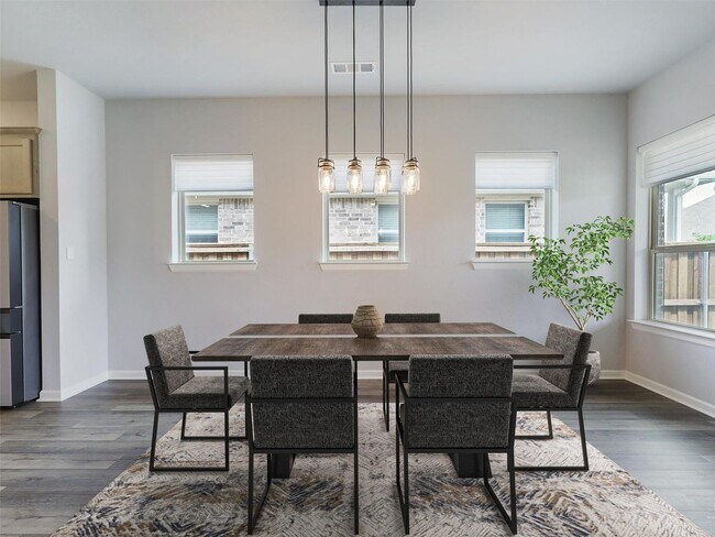 Building Photo - Upgrades galore and ready Now!