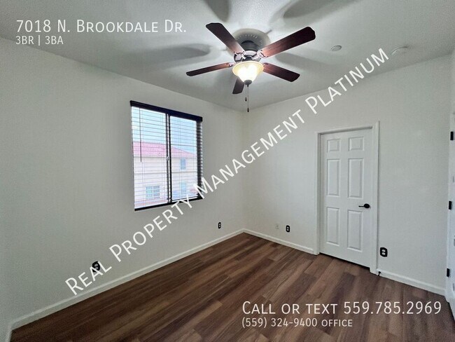 Building Photo - 7018 N Brookdale Dr