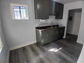 Building Photo - 8641 1/2 S Hoover St