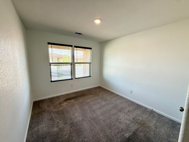 Building Photo - Spacious 4 Bedroom Home with Solar & Modern Upgrades- Available Now!