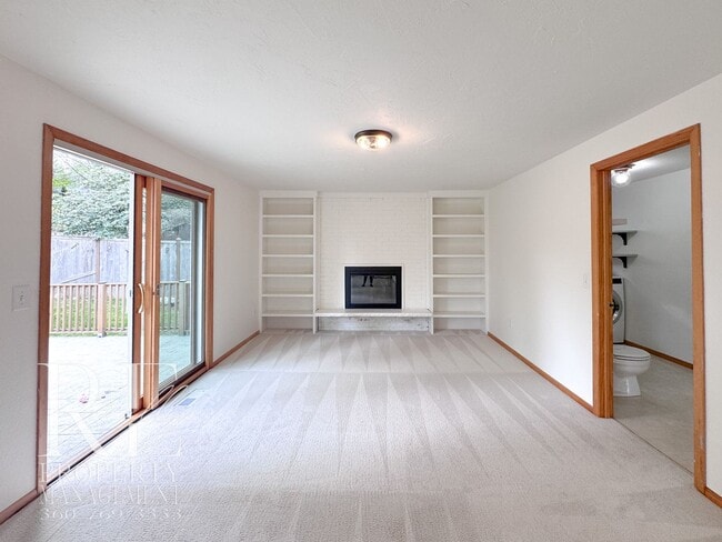 Building Photo - Bright & Spacious Single-Level Home with Dual Living Areas