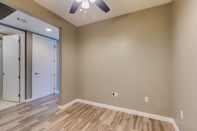 Building Photo - Iconic Strip-View Luxury | Elegant 1BR + Den High-Rise Residence