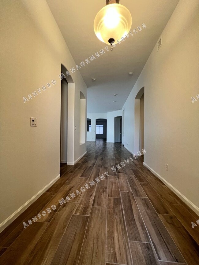 Building Photo - COME HOME TO LUXURY IN GATED GRAYHAWK GOLF...
