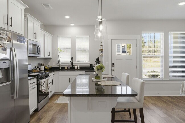 Building Photo - Luxury 3BR/2.5BA Craftsman Townhome with Designer Finishes & Open-Concept Living in Trailside at ...