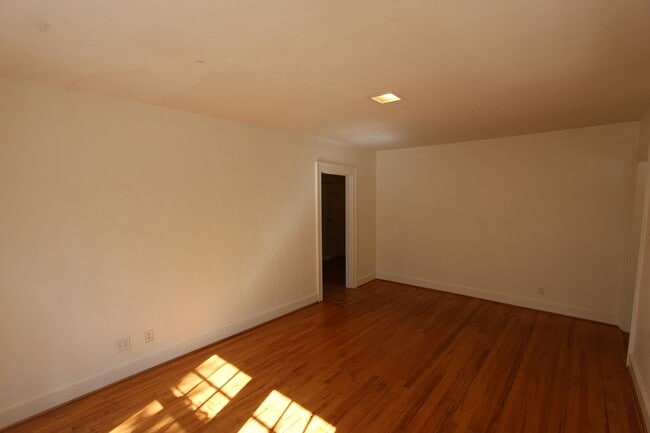 Building Photo - Charming 3BR Home Downtown | Hardwood Floors + In-Unit Washer/Dryer