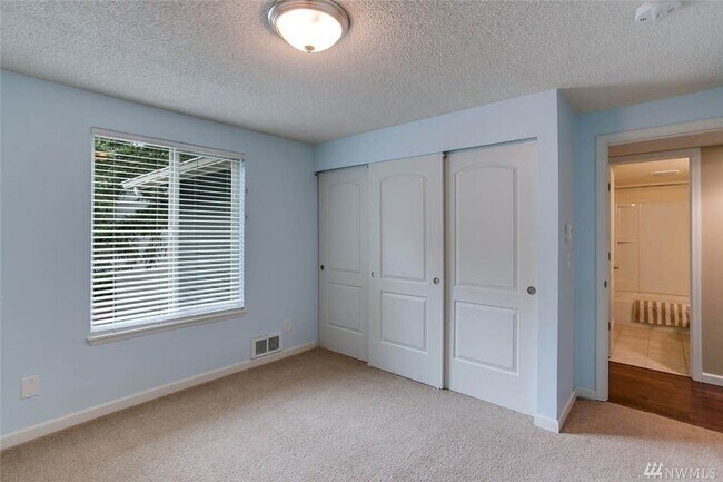 Bedroom #3 Closet - 4647 W Lake Sammamish Pkwy SE