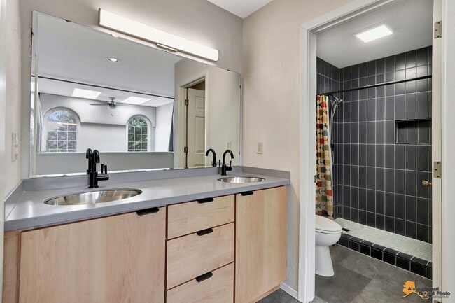 Building Photo - Spacious and bright condo located in a quiet area that boasts the perfect combination of style an...