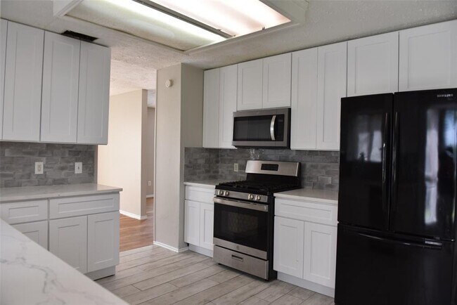 Building Photo - Glenmeadow Drive, Stafford, TX 77477 - 4 BR 2.5 BA single-family home
