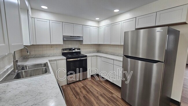 Building Photo - 3718 E 22nd Ave