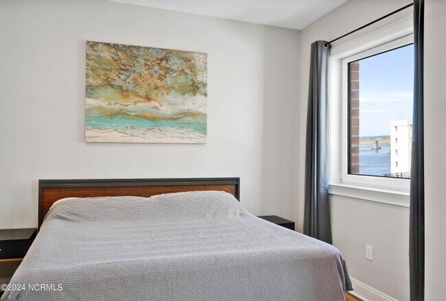 Building Photo - Welcome to your dream condo in the heart o...