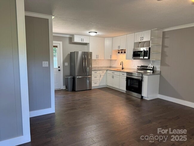 Building Photo - 5597 Wrenn Dr