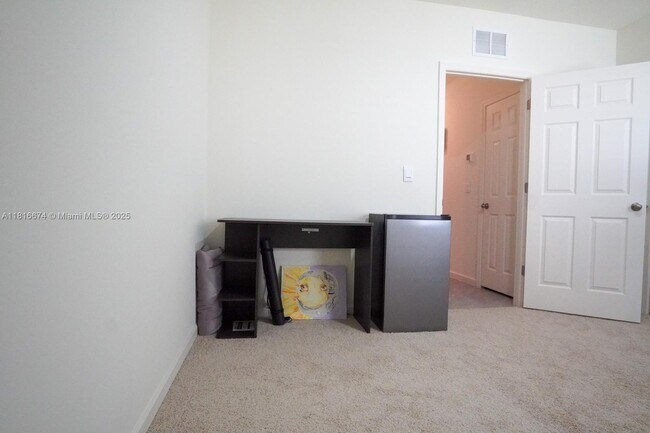 Building Photo - 10770 SW Vasari Way