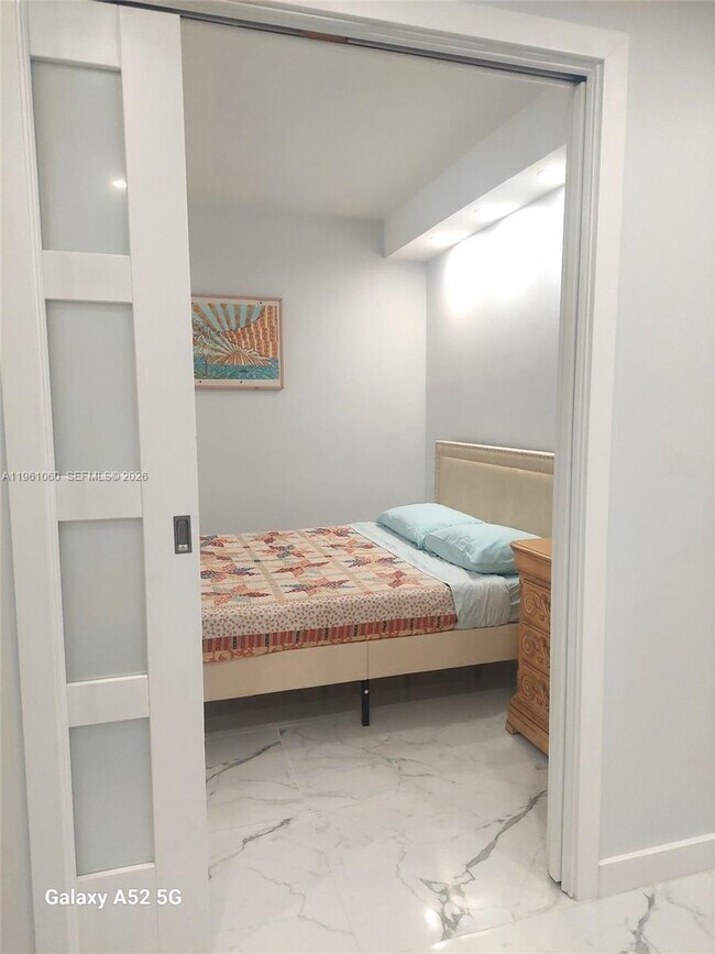 Building Photo - 5005 Collins Ave