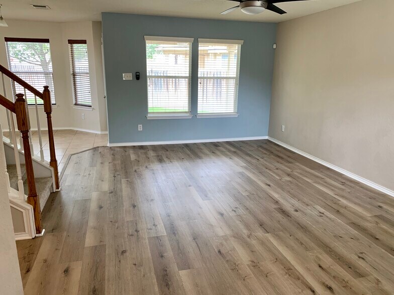 Large living area looking out to backyard - 10219 Roseangel Ln