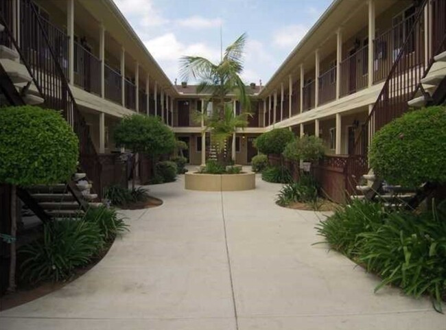 Building Photo - AFFORDABLE 1st Floor Condo & patio yard!