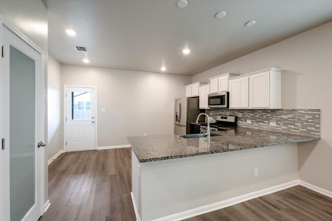 Building Photo - Solar-Powered Home with Modern Finishes & Included Fridge