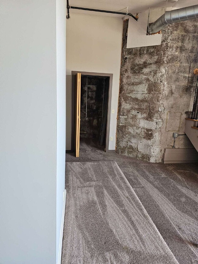 Building Photo - Unique 2 Bedroom Downtown Mount Clemens Loft with Updated Kitchen, Spacious Living Room, Balcony ...