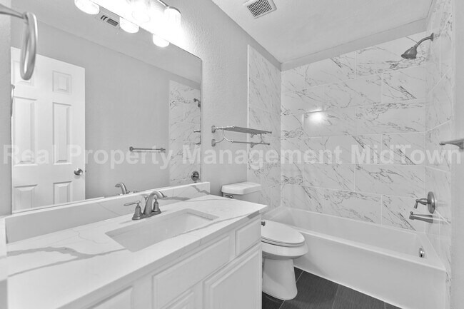 Building Photo - 6100 Wall St