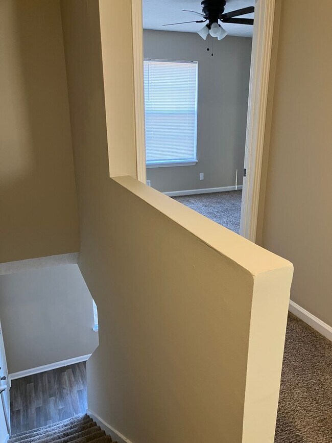 Building Photo - 2 story end unit condo