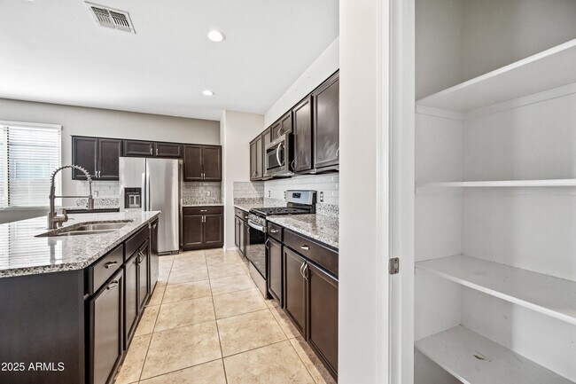 Building Photo - 31027 W Mulberry Dr