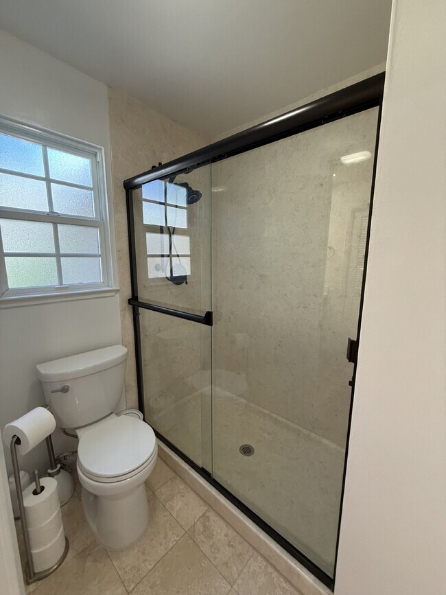 Building Photo - Stunning Fully Remodeled 4-Bedroom 2 Bathroom Home with Designer Kitchen & Spacious Open Layout i...