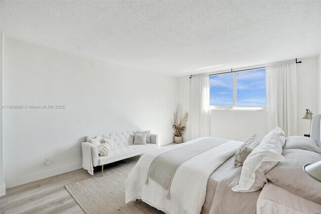 Building Photo - 19380 Collins Ave