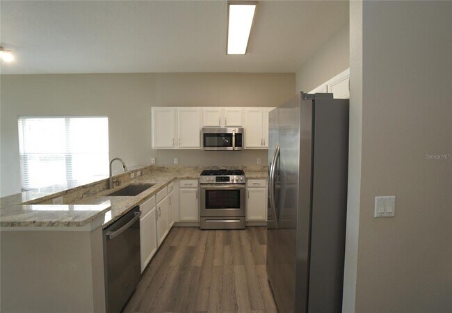 Building Photo - 9468 Leatherwood Ave
