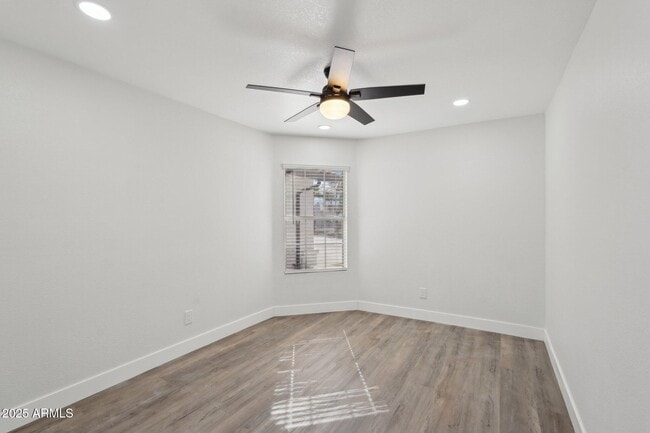 Building Photo - 5704 E Estrid Ave