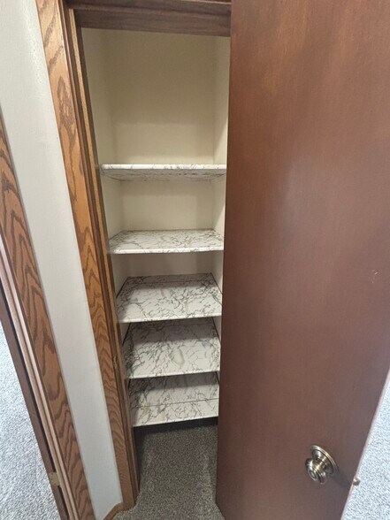 Linen closet - 700 E College Ave