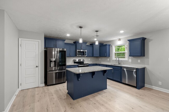 Building Photo - Pet Friendly Four Bedroom!