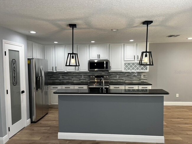 Building Photo - 2705 Wild Tamarind Blvd