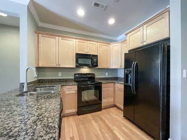 Building Photo - COMING SOON! Charlotte Living at Its Best!...