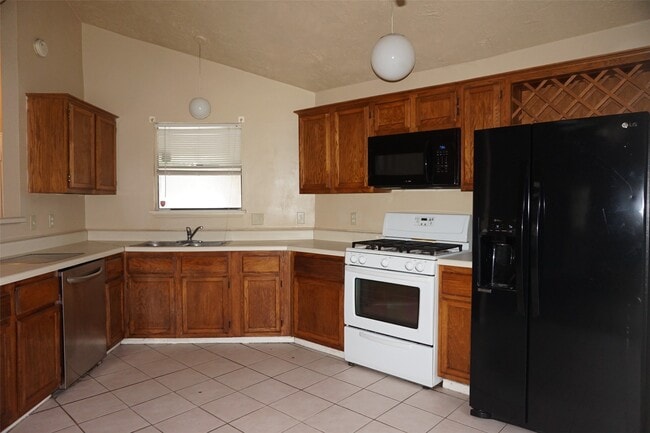 Building Photo - 6023 Woodmancote Dr