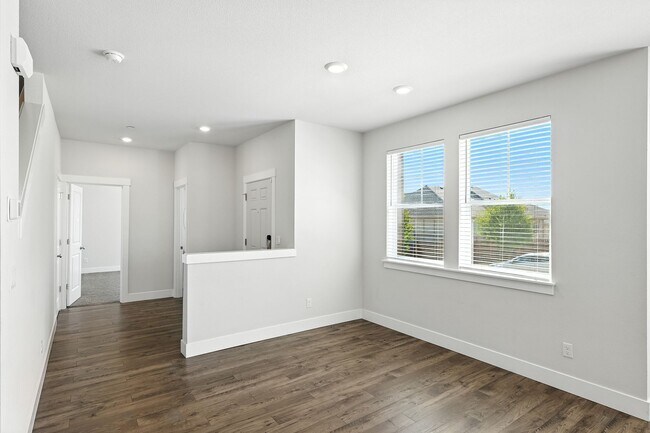 Building Photo - Spacious 4-Bedroom Home, Plus Den/Office with Modern Upgrades and Great Amenities