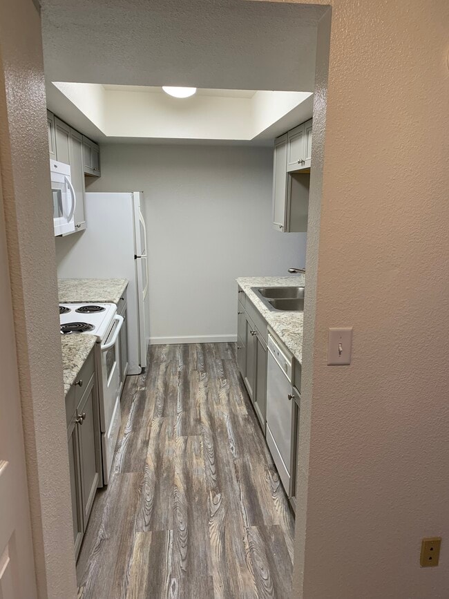 Building Photo - 2201 E 66th Ave