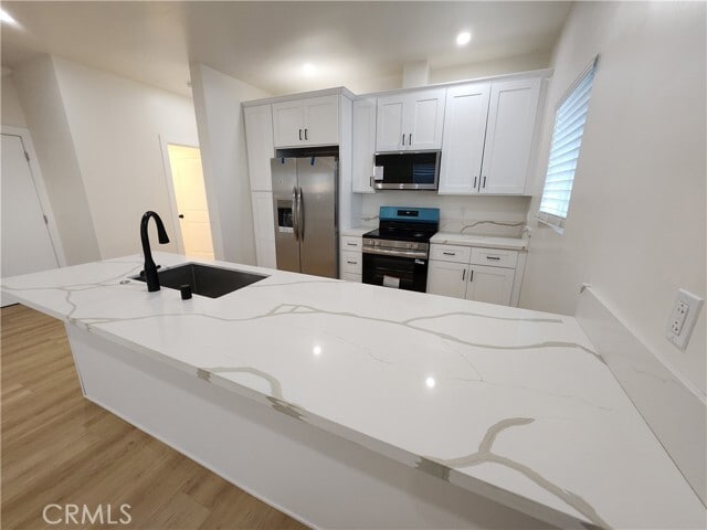 Building Photo - 18252 Saticoy St