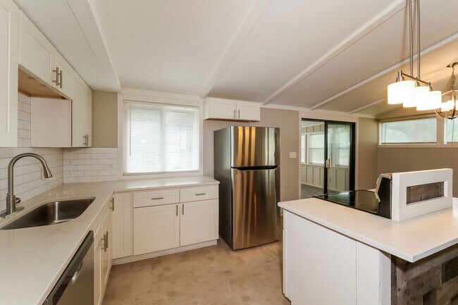 Building Photo - 4BR/2BA | Newly Renovated Single Family Home | 1-Car Garage Parking  | Fenced yard!
