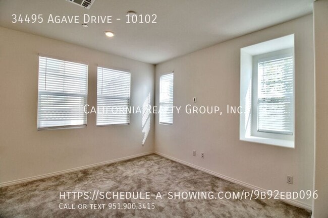 Building Photo - 34495 Agave Dr