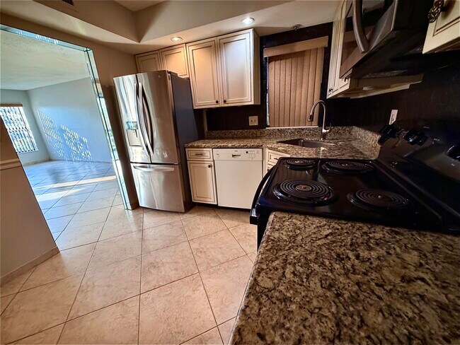 Building Photo - 8657 Boca Glades Blvd W
