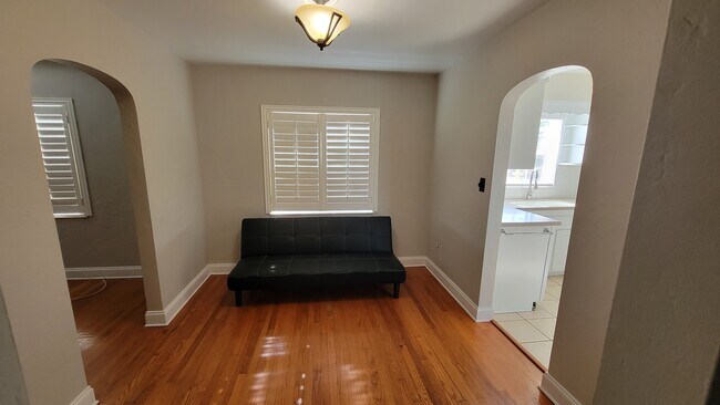 Dining room from hall entrance, with living room on the left and kitchen on the right - 4359 4th Ave. S.