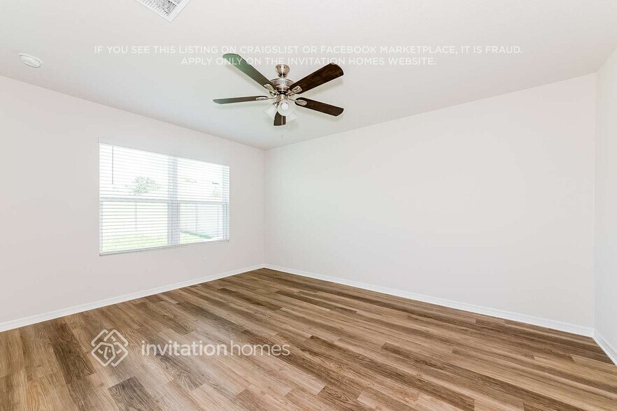 Building Photo - 8017 Majestic Palms Ct