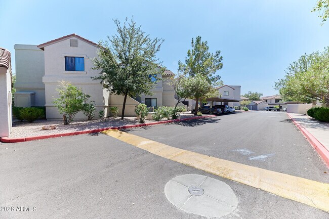 Building Photo - 9555 E Raintree Dr