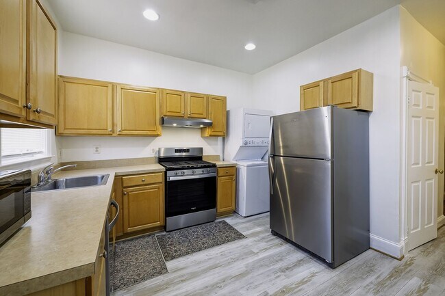 Building Photo - Historic & Charming 3BR Rowhouse near Howard is Move-in Ready!