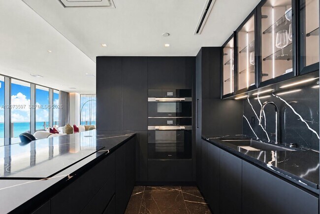 Building Photo - 5875 Collins Ave
