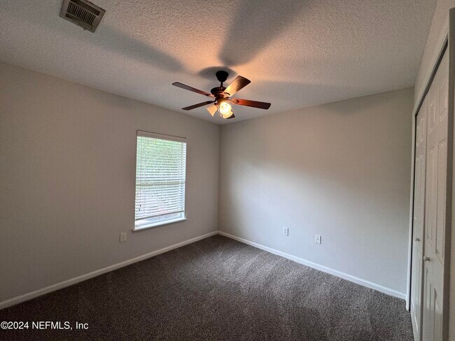 Building Photo - 6985 Ortega Woods Dr