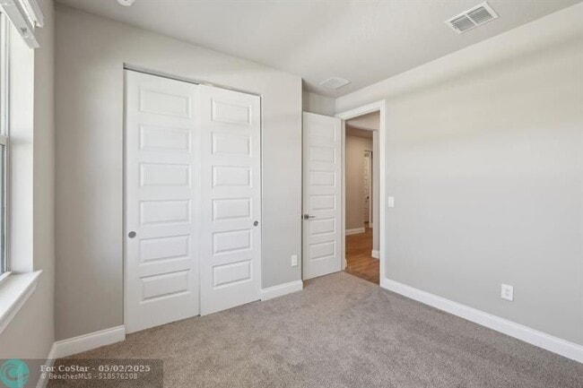 Building Photo - 9041 Dahlia Cir