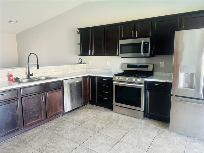 Building Photo - 9927 S Phoenix Dr