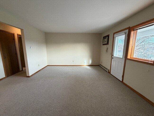Building Photo - Two Bedroom Apartment - Upper Unit. Byron Center Schools!