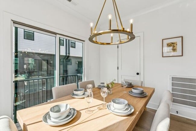 Building Photo - High-End 2BR Townhome | Rooftop Terrace + 2-Car Garage | 24-Unit Community