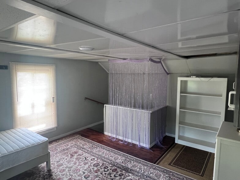 2nd floor bedroom #1 with dressers and twin bed - 668 Brooklyn Ave